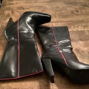 Women’s black leather boots with red stripe one the side. Size 9b